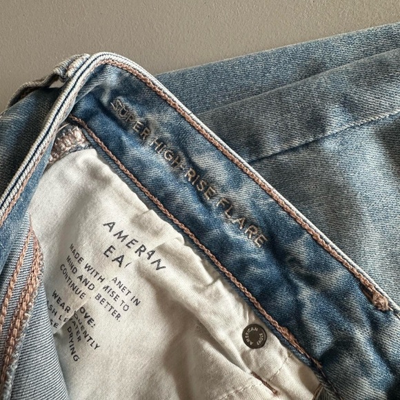 American Eagle Super Hi-Rise Distressed Flare Jeans - Picture 3 of 8